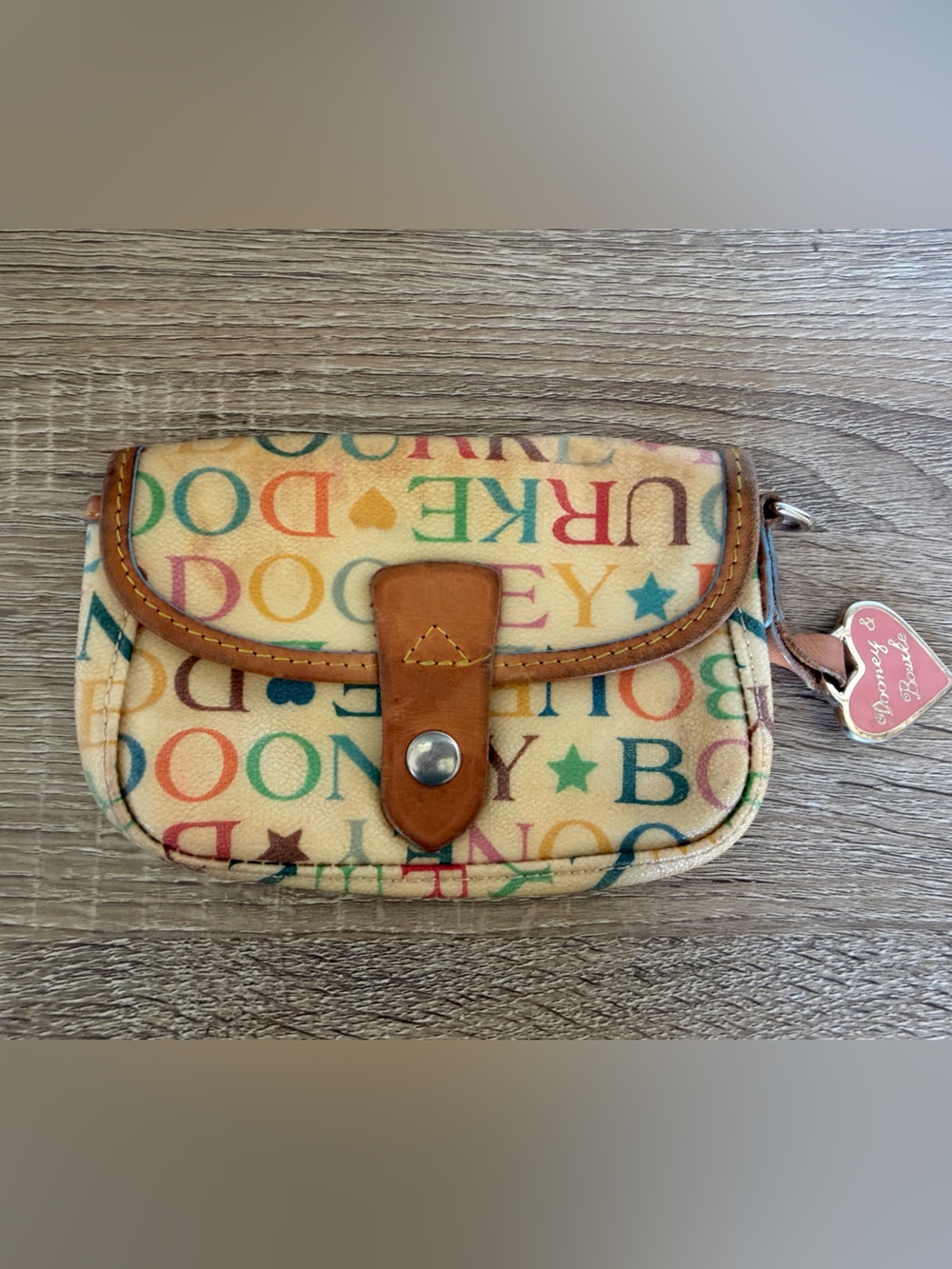 Dooney & Bourke Cream Multicolor Logo Wristlet with Heart Charm